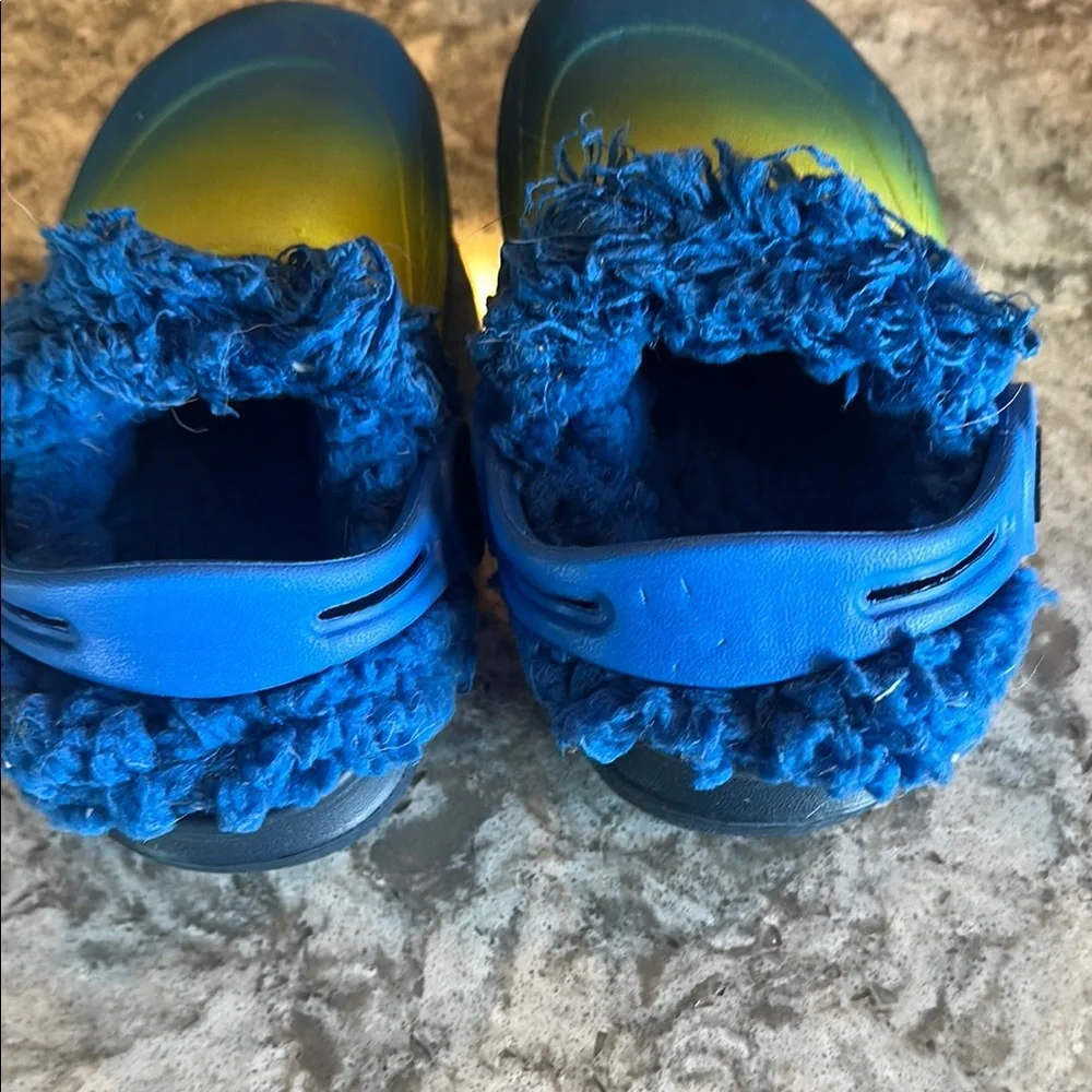 Kids Blue and yellow Shoes like crocs but not.